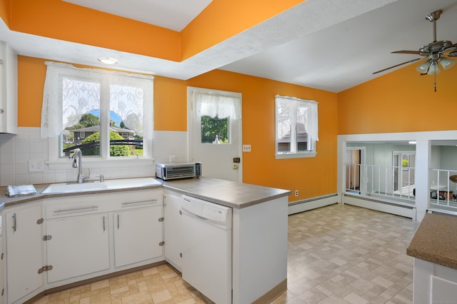 101 Rosengarten Dr, Waterbury, CT 06704 - kitchen with dishwasher, ceiling fan, a peninsula, a sink, and decorative backsplash