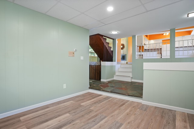 101 Rosengarten Dr, Waterbury, CT 06704 - spare room with wood finished floors, stairs, and baseboards