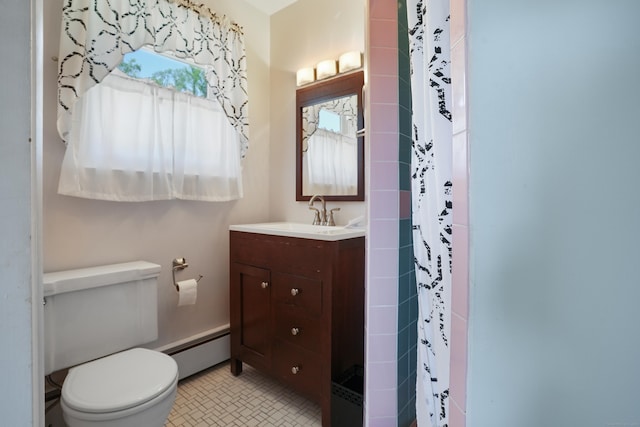 101 Rosengarten Dr, Waterbury, CT 06704 - full bathroom with a baseboard heating unit, toilet, vanity, and curtained shower