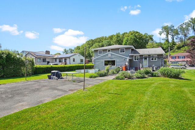 101 Rosengarten Dr, Waterbury, CT 06704 - view of front of home featuring a front yard and a residential view