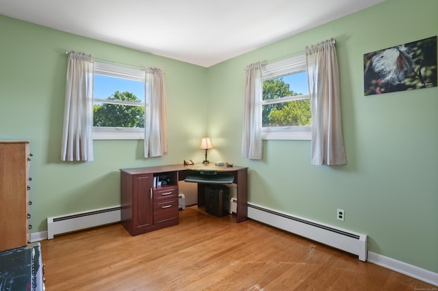 101 Rosengarten Dr, Waterbury, CT 06704 - office space with a baseboard heating unit, baseboard heating, light wood-type flooring, and baseboards