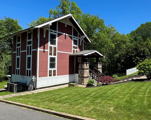 135 Poplar Dr, Cheshire, CT 06410 - view of front of home with a front lawn