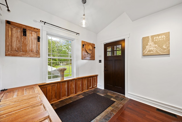 135 Poplar Dr, Cheshire, CT 06410 - entrance foyer with lofted ceiling, plenty of natural light, dark stone finish flooring, and baseboards