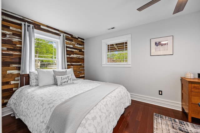 135 Poplar Dr, Cheshire, CT 06410 - bedroom featuring baseboards, wood finished floors, ceiling fan, and wood walls