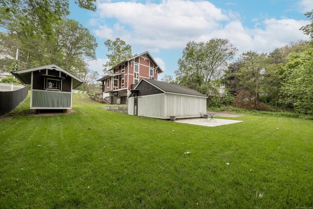 135 Poplar Dr, Cheshire, CT 06410 - view of green lawn featuring a patio area