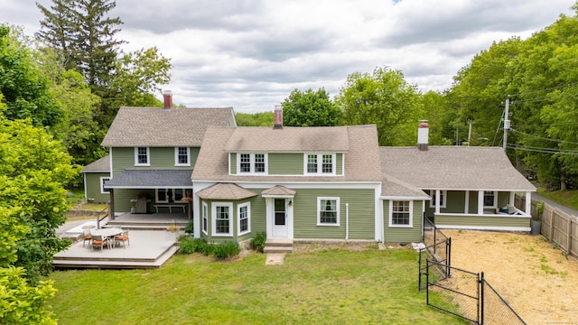 538 Scotland Rd, Norwich, CT 06360 - view of front of house with a chimney, a gate, a wooden deck, and roof with shingles