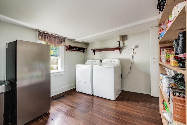 538 Scotland Rd, Norwich, CT 06360 - laundry area featuring baseboards, washing machine and clothes dryer, and dark wood-type flooring
