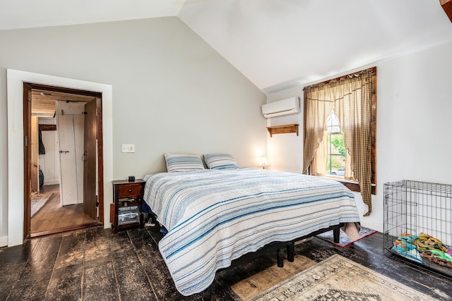538 Scotland Rd, Norwich, CT 06360 - bedroom featuring a wall mounted AC, vaulted ceiling, wood finished floors, and baseboards