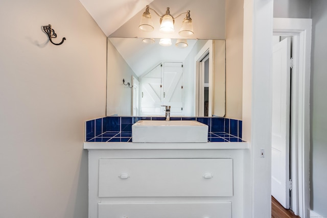 538 Scotland Rd, Norwich, CT 06360 - bathroom with vaulted ceiling and vanity