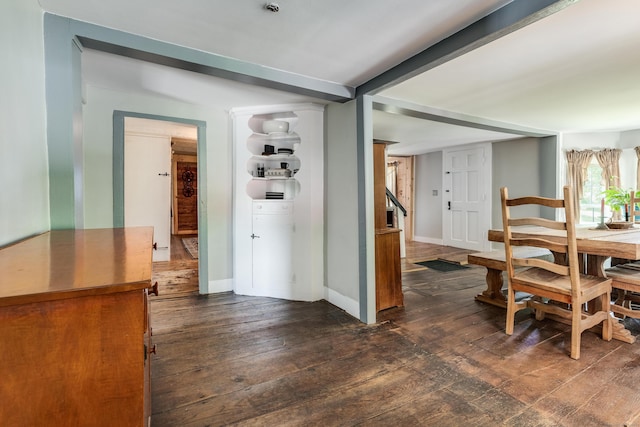 538 Scotland Rd, Norwich, CT 06360 - dining space with dark wood-style floors and baseboards