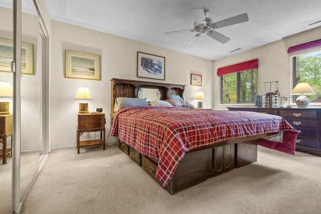 9 Lower Commons Unit 9, Woodbury, CT 06798 - bedroom featuring light colored carpet, multiple windows, and ceiling fan