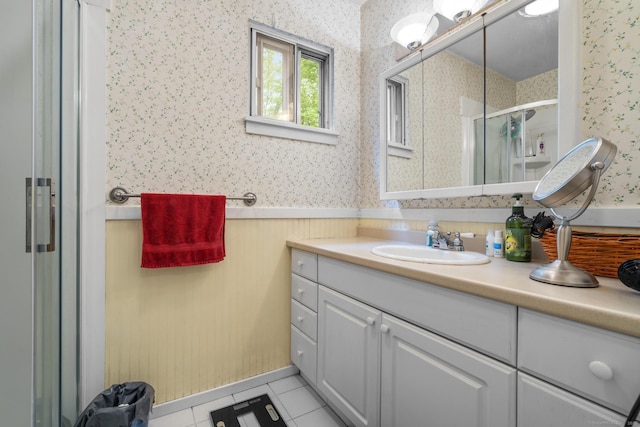 9 Lower Commons Unit 9, Woodbury, CT 06798 - full bath with wallpapered walls, vanity, a stall shower, tile patterned floors, and wainscoting