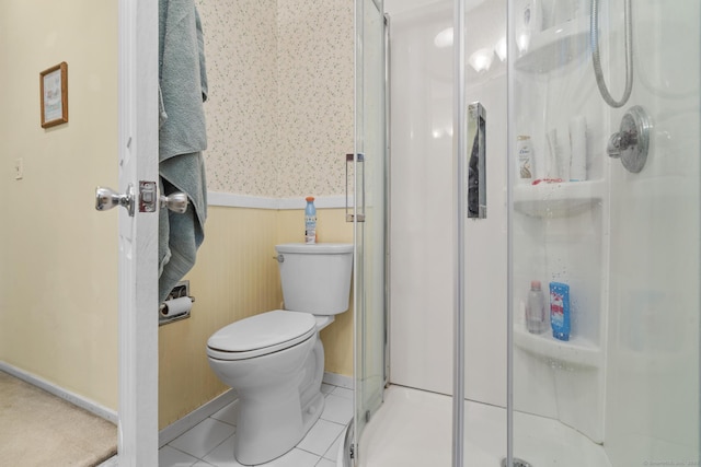 9 Lower Commons Unit 9, Woodbury, CT 06798 - full bathroom with a wainscoted wall, a shower stall, toilet, wallpapered walls, and tile patterned floors