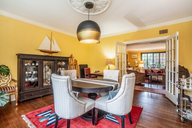 182 Fern St Apt 4, West Hartford, CT 06119 - dining space with french doors, wood finished floors, and crown molding