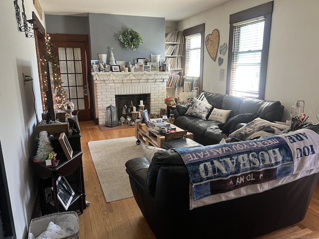 66 Seymour Ave, Derby, CT 06418 - living area featuring a fireplace and wood finished floors