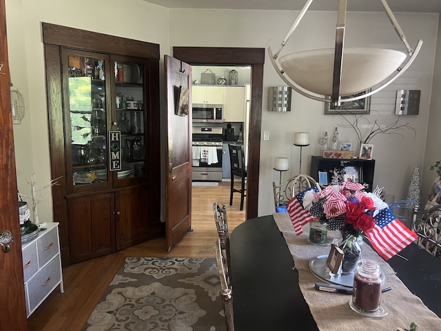 66 Seymour Ave, Derby, CT 06418 - dining area featuring wood finished floors