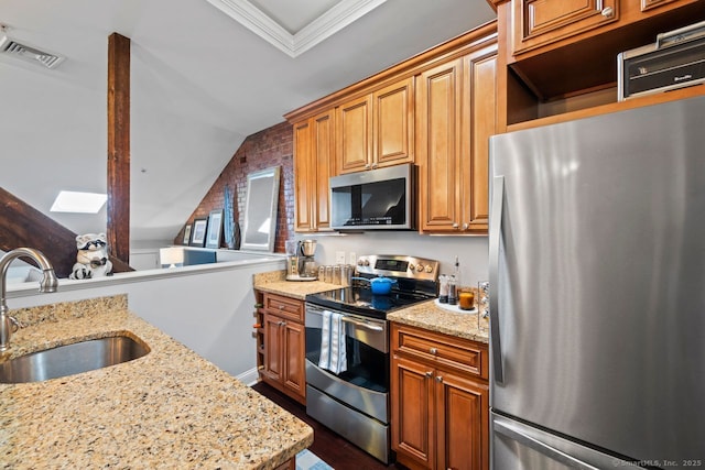 461 Bank St Unit 410, New London, CT 06320 - kitchen featuring stainless steel appliances, a sink, dark wood-type flooring, light stone counters, and lofted ceiling