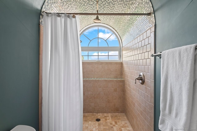 461 Bank St Unit 410, New London, CT 06320 - bathroom featuring tiled shower and toilet