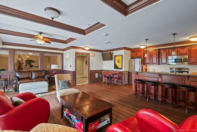 461 Bank St Unit 410, New London, CT 06320 - living area with crown molding, dark wood-type flooring, a wainscoted wall, and ceiling fan