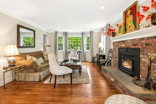 19 Pheasant Ridge Rd, Redding, CT 06896 - living room with ornamental molding, wood finished floors, baseboards, and a brick fireplace