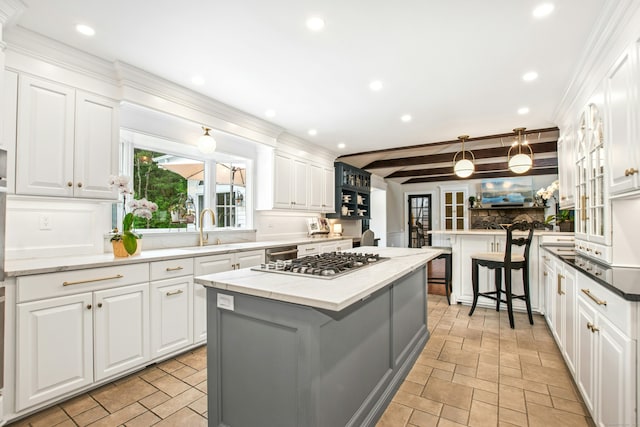 19 Pheasant Ridge Rd, Redding, CT 06896 - kitchen with a sink, appliances with stainless steel finishes, white cabinets, recessed lighting, and a center island
