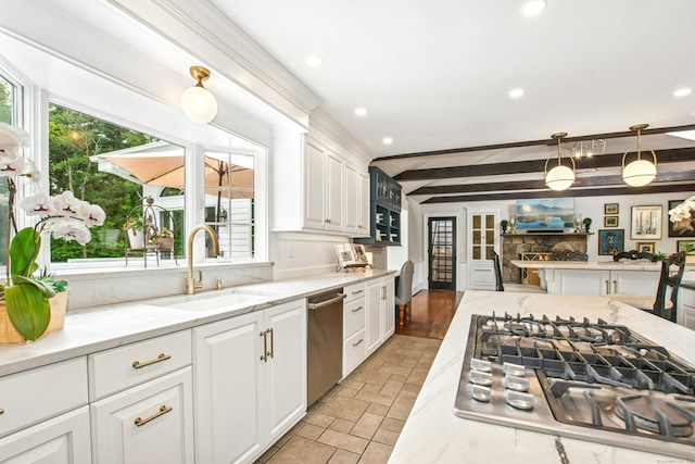 19 Pheasant Ridge Rd, Redding, CT 06896 - kitchen featuring stainless steel appliances, healthy amount of natural light, a sink, white cabinetry, and beam ceiling