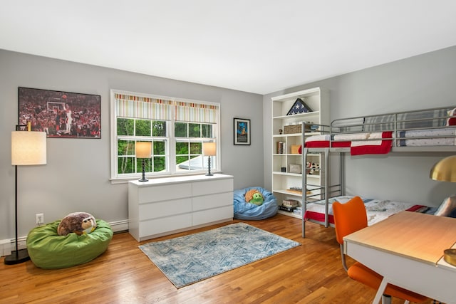 19 Pheasant Ridge Rd, Redding, CT 06896 - bedroom with wood finished floors and a baseboard radiator