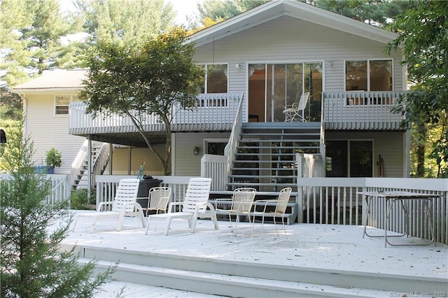 3 Abbey Ln, Shelton, CT 06484 - back of property featuring stairway and a wooden deck
