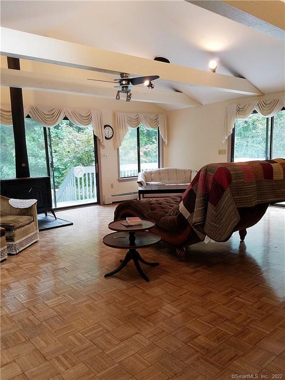 3 Abbey Ln, Shelton, CT 06484 - living area featuring a wood stove