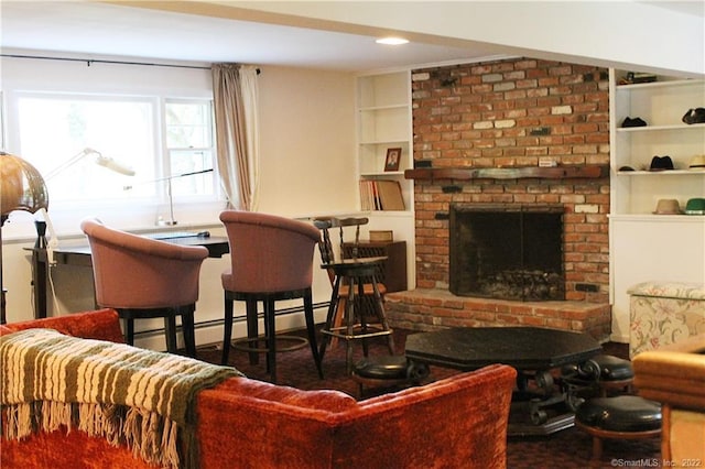 3 Abbey Ln, Shelton, CT 06484 - living area featuring built in shelves, baseboard heating, and a brick fireplace
