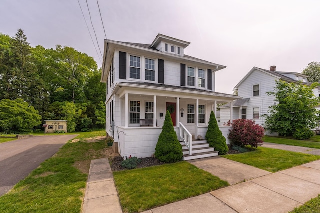 36 Whiton St, Windsor Locks, CT 06096 - american foursquare style home with covered porch and a front lawn