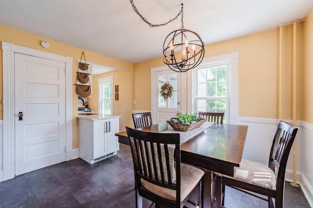 36 Whiton St, Windsor Locks, CT 06096 - dining space with a chandelier, healthy amount of natural light, and baseboards