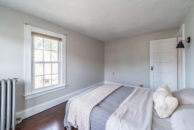 36 Whiton St, Windsor Locks, CT 06096 - bedroom with radiator, baseboards, and dark wood finished floors