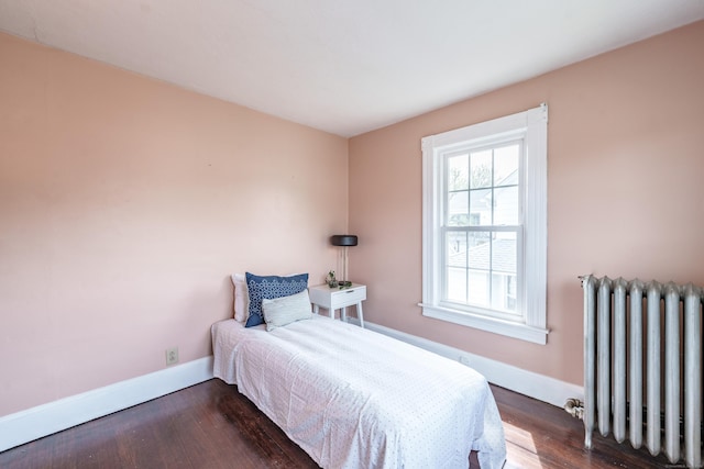 36 Whiton St, Windsor Locks, CT 06096 - bedroom with radiator heating unit, baseboards, and wood finished floors