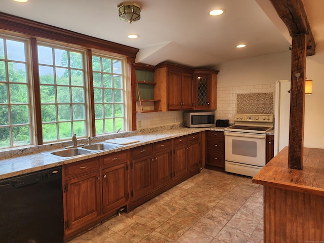 749 W Rd, Salem, CT 06420 - kitchen with electric stove, stainless steel microwave, black dishwasher, a sink, and healthy amount of natural light