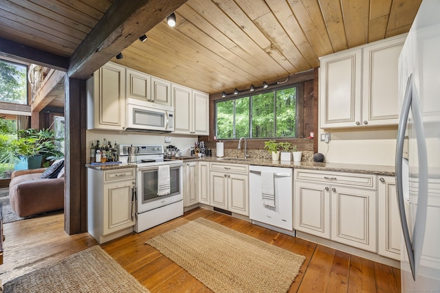 18 Grey Fox Trl, Woodbury, CT 06798 - kitchen featuring white appliances, wood ceiling, a sink, light wood-style floors, and light stone countertops