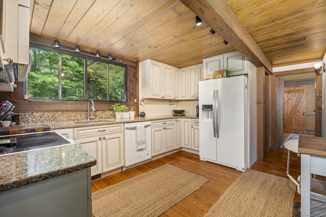18 Grey Fox Trl, Woodbury, CT 06798 - kitchen with white appliances, a sink, wooden ceiling with exposed beams, light wood-type flooring, and dark stone countertops
