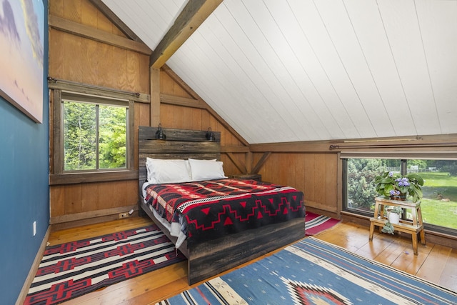 18 Grey Fox Trl, Woodbury, CT 06798 - bedroom with hardwood / wood-style floors, wood walls, and baseboards