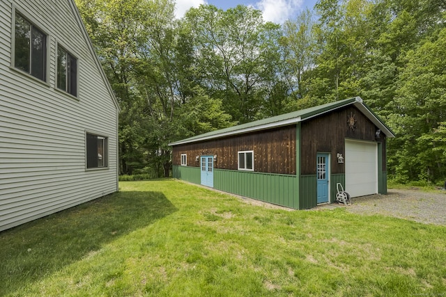 18 Grey Fox Trl, Woodbury, CT 06798 - view of home's exterior featuring an outbuilding, a yard, and a detached garage