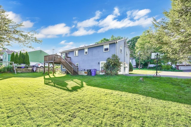 278 High St, Bristol, CT 06010 - back of house with stairs, a wooden deck, and a yard