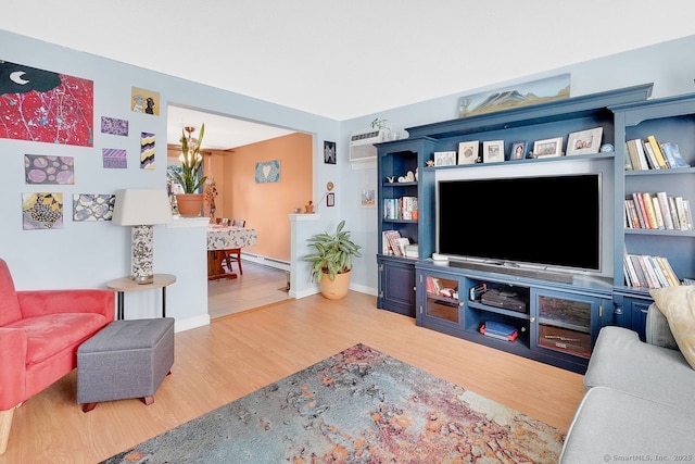 278 High St, Bristol, CT 06010 - living room featuring wood finished floors, baseboard heating, and baseboards