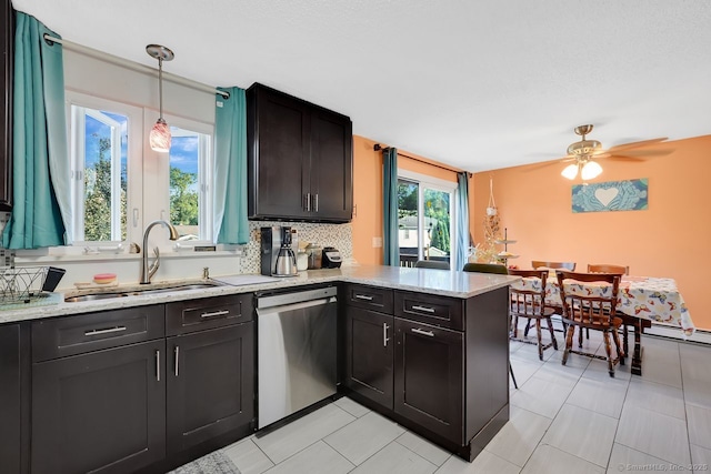 278 High St, Bristol, CT 06010 - kitchen featuring dishwasher, a sink, a peninsula, hanging light fixtures, and light stone countertops