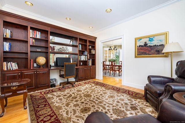 66 Great Pond Rd, Glastonbury, CT 06073 - office space with crown molding, light wood finished floors, a chandelier, built in study area, and recessed lighting