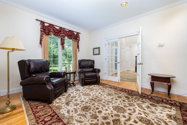66 Great Pond Rd, Glastonbury, CT 06073 - living area featuring crown molding, wood finished floors, baseboards, and french doors