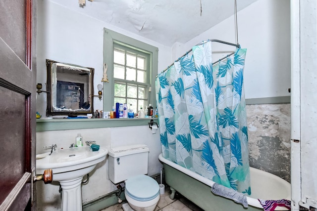 400 E Ave, Bridgeport, CT 06610 - full bathroom featuring toilet and shower / bath combo with shower curtain