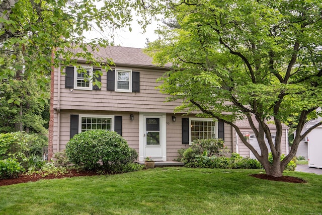60 Longlane Rd, West Hartford, CT 06117 - colonial house featuring a front yard and a shingled roof