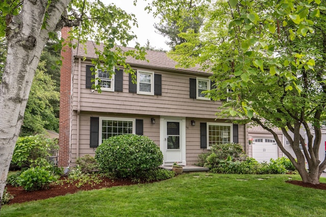 60 Longlane Rd, West Hartford, CT 06117 - colonial-style house featuring a chimney, a front lawn, a garage, and roof with shingles