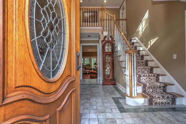 16 Black Rock Tpke, Redding, CT 06896 - foyer with ornamental molding, stone tile flooring, baseboards, and stairway