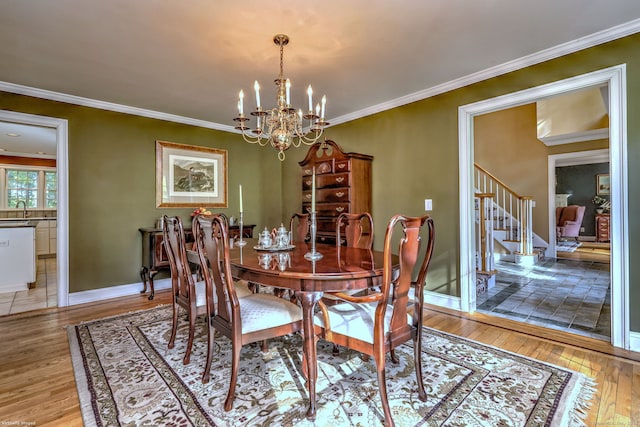 16 Black Rock Tpke, Redding, CT 06896 - dining space featuring a chandelier, light wood-type flooring, stairway, ornamental molding, and baseboards