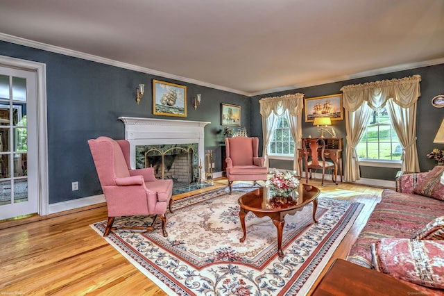16 Black Rock Tpke, Redding, CT 06896 - living area with wood finished floors, crown molding, a premium fireplace, and baseboards